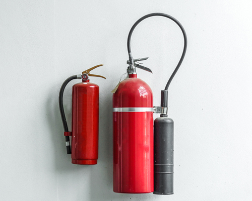 Fire Extinguisher Hung on the Wall 